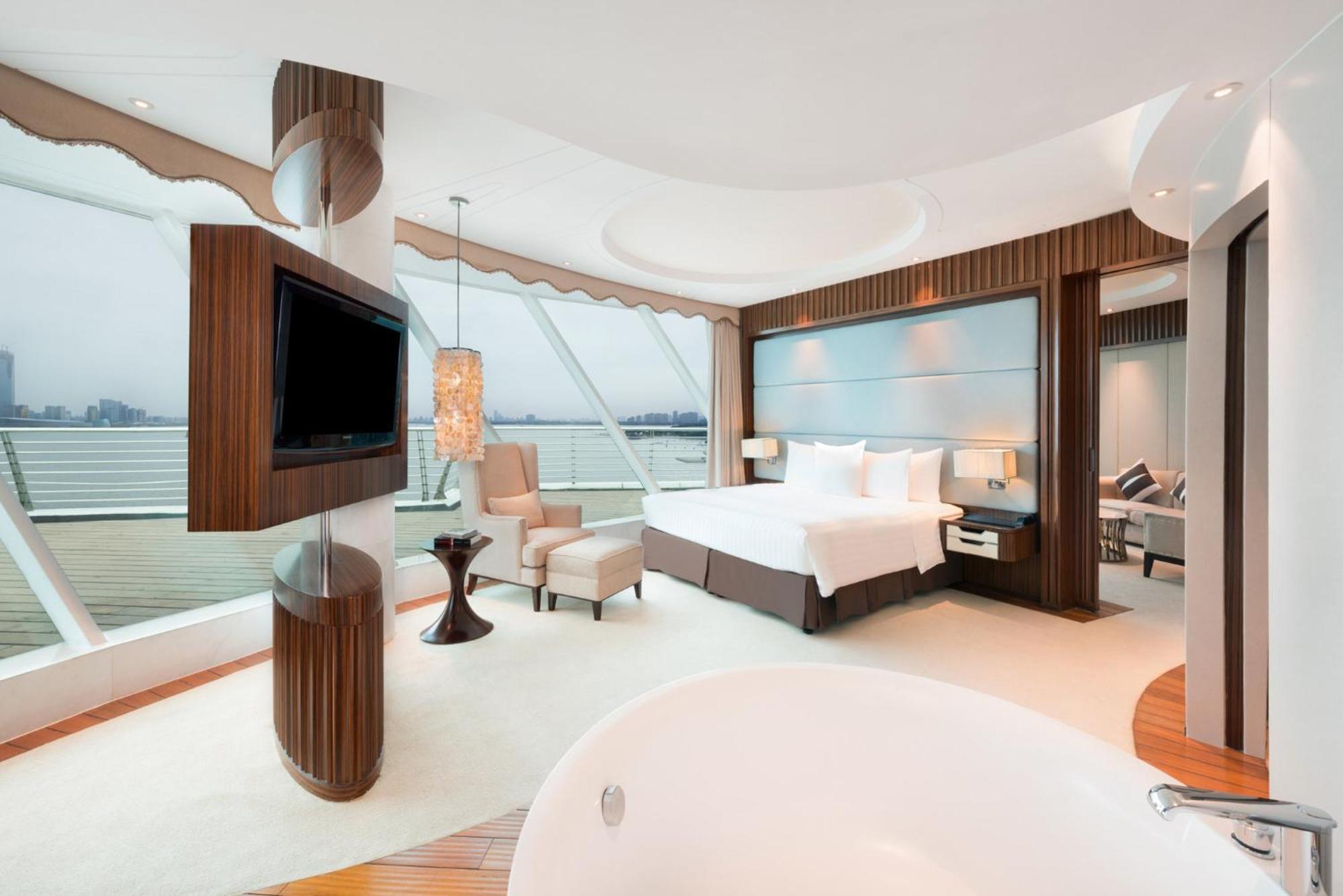 Suite Captain mit 1 Kingsize-Bett, Zugang zur Lounge und Seeblick
