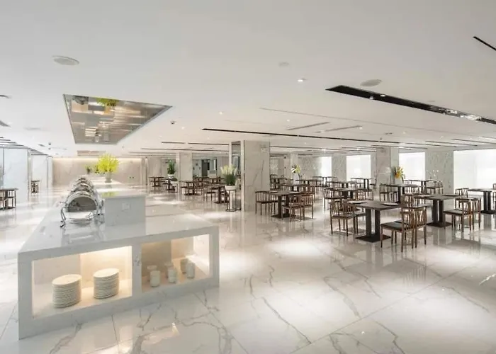 Ramada By Wyndham Mengzi Suites, China